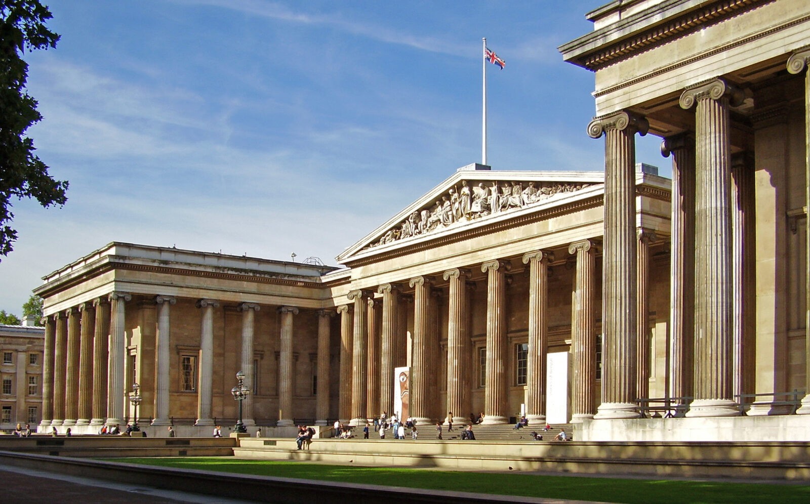 The British Museum viewed from the northeast, showcasing its grand neoclassical façade with Ionic columns and stone architecture.